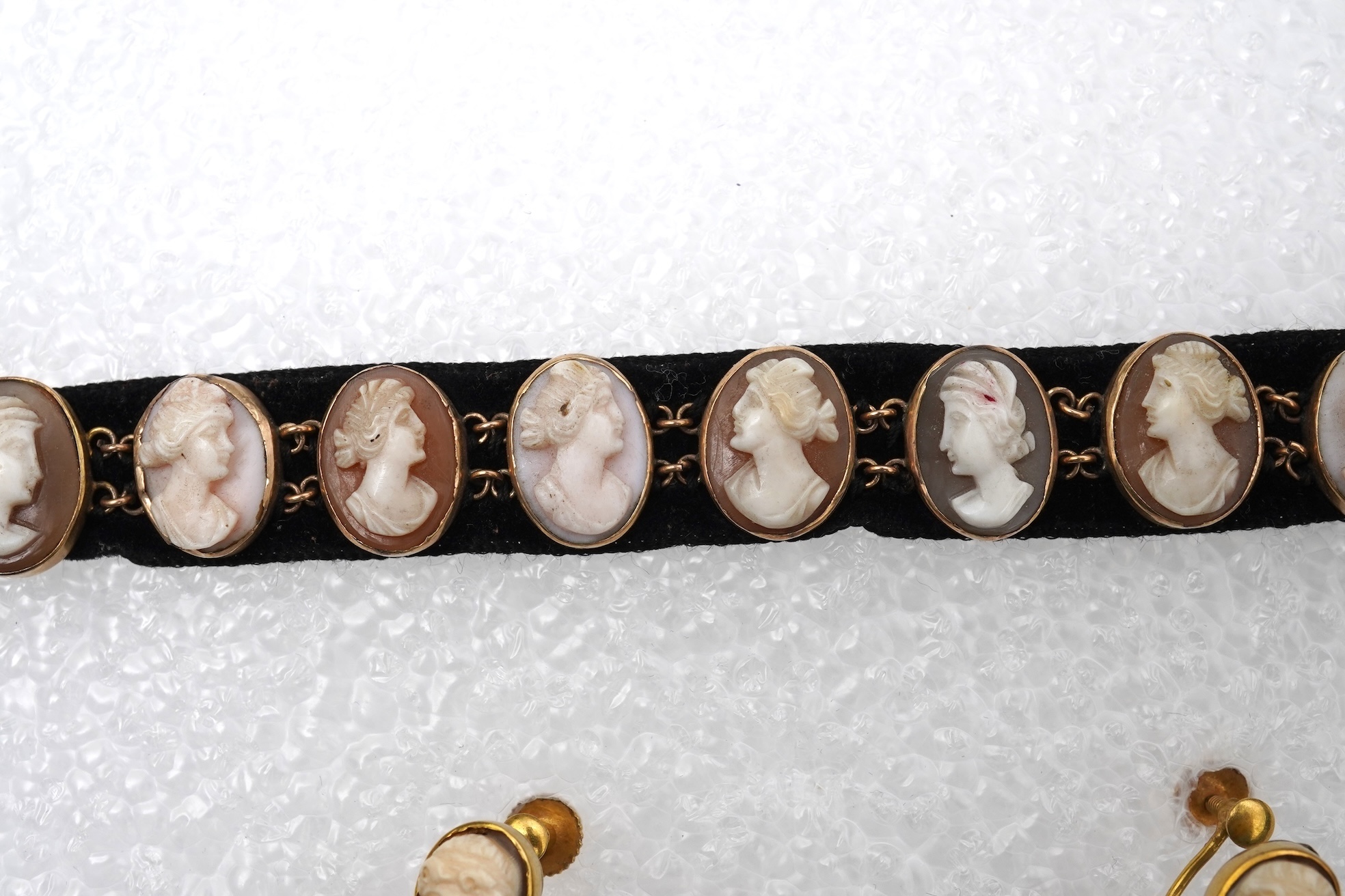 A pair of shell cameo earrings and bracelet, 19th century